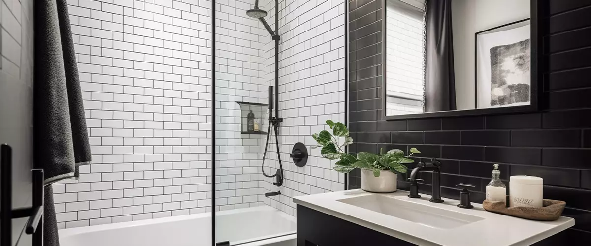 Black and white bathroom with subway tile and glass shower panel